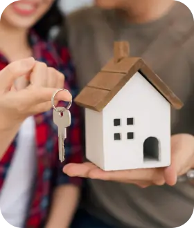 women giving house key